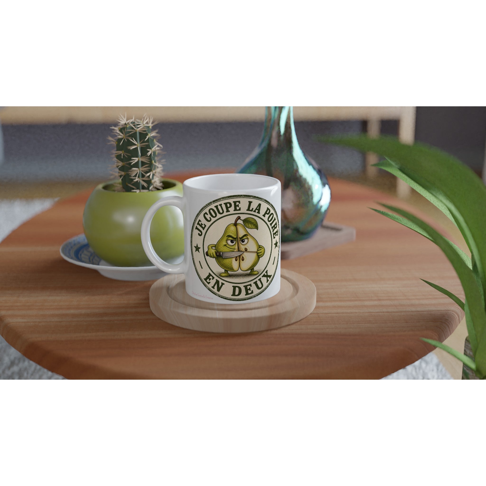 Mug blanc avec poire verte, couteau illustré et inscription « En deux »