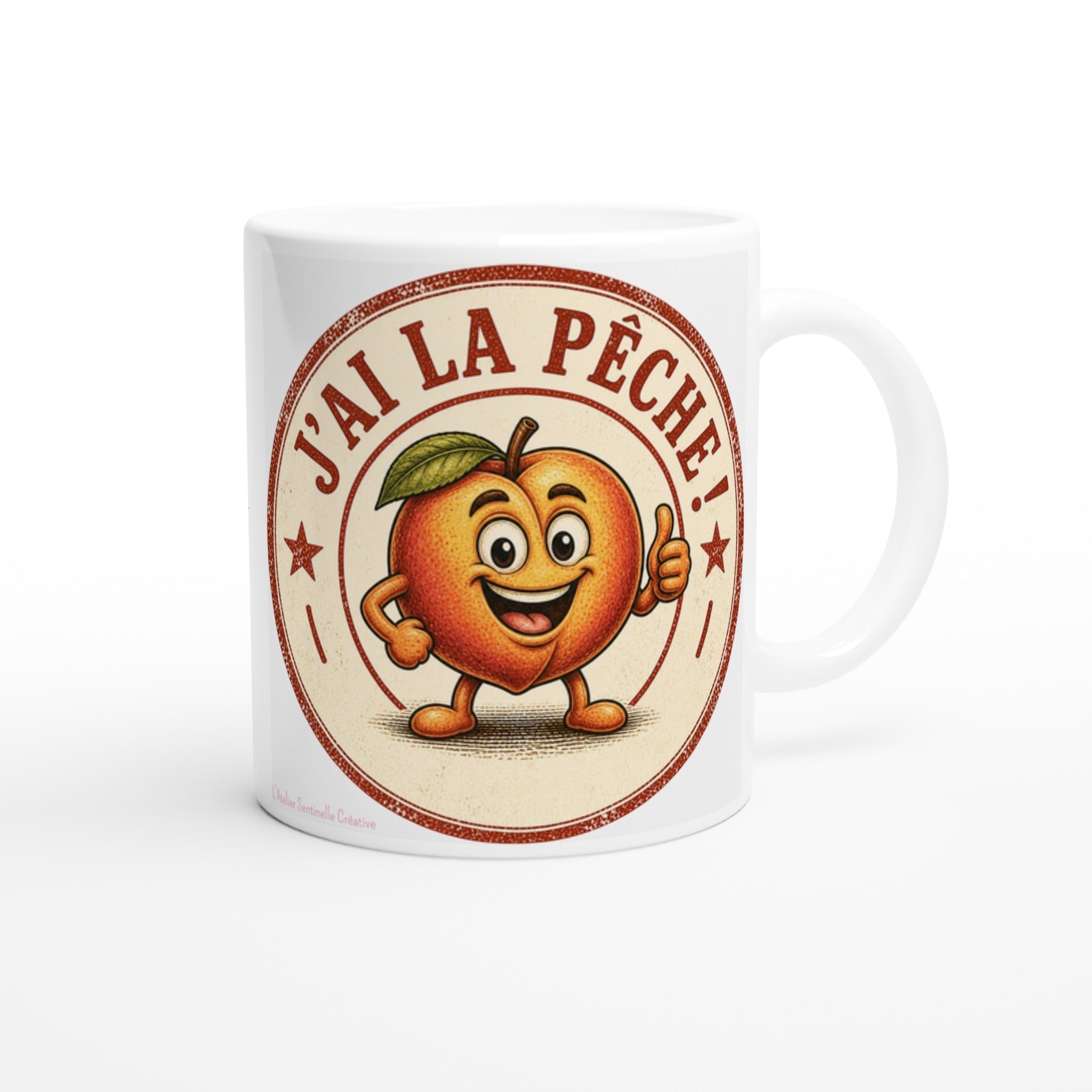 Mug blanc avec motif "J'ai la pêche" centré et poignée blanche sur le côté.