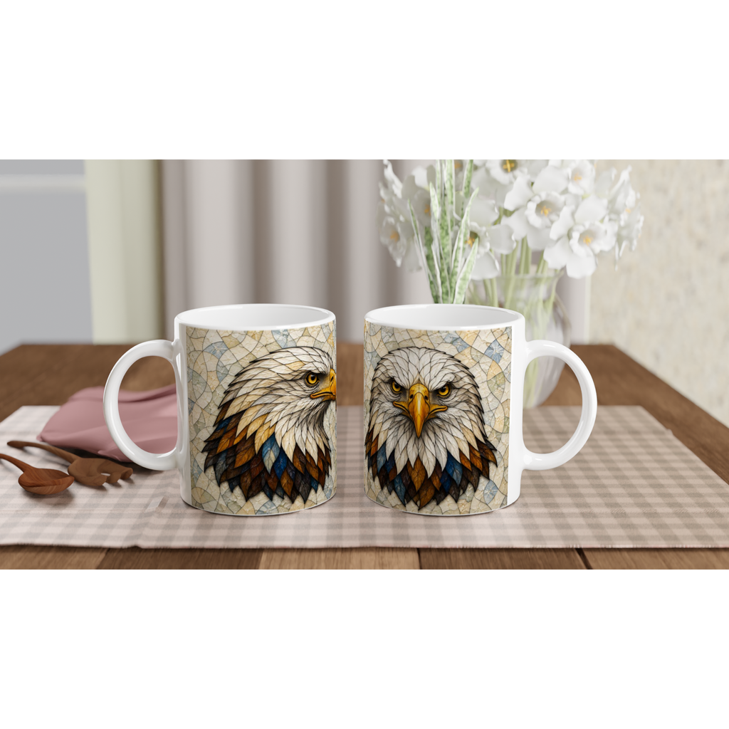 Paire de tasses en céramique blanches avec motif tête d’aigle coloré sur le devant