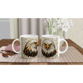 Paire de tasses en céramique blanches avec motif tête d’aigle coloré sur le devant