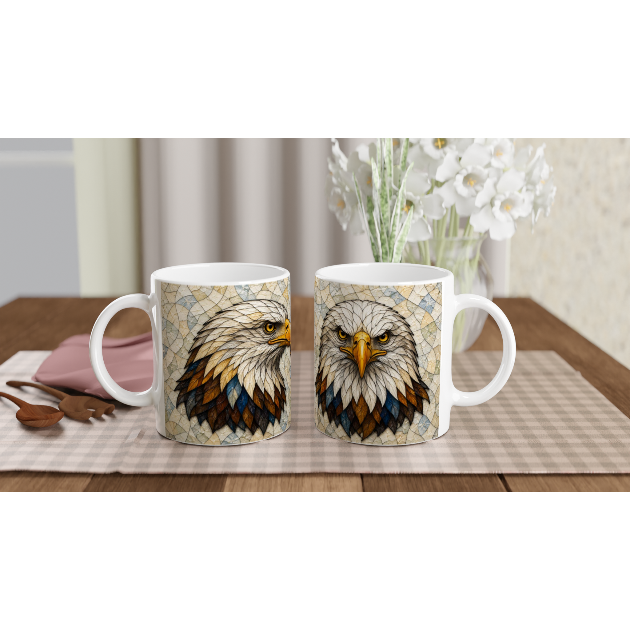 Paire de tasses en céramique blanches avec motif tête d’aigle coloré sur le devant