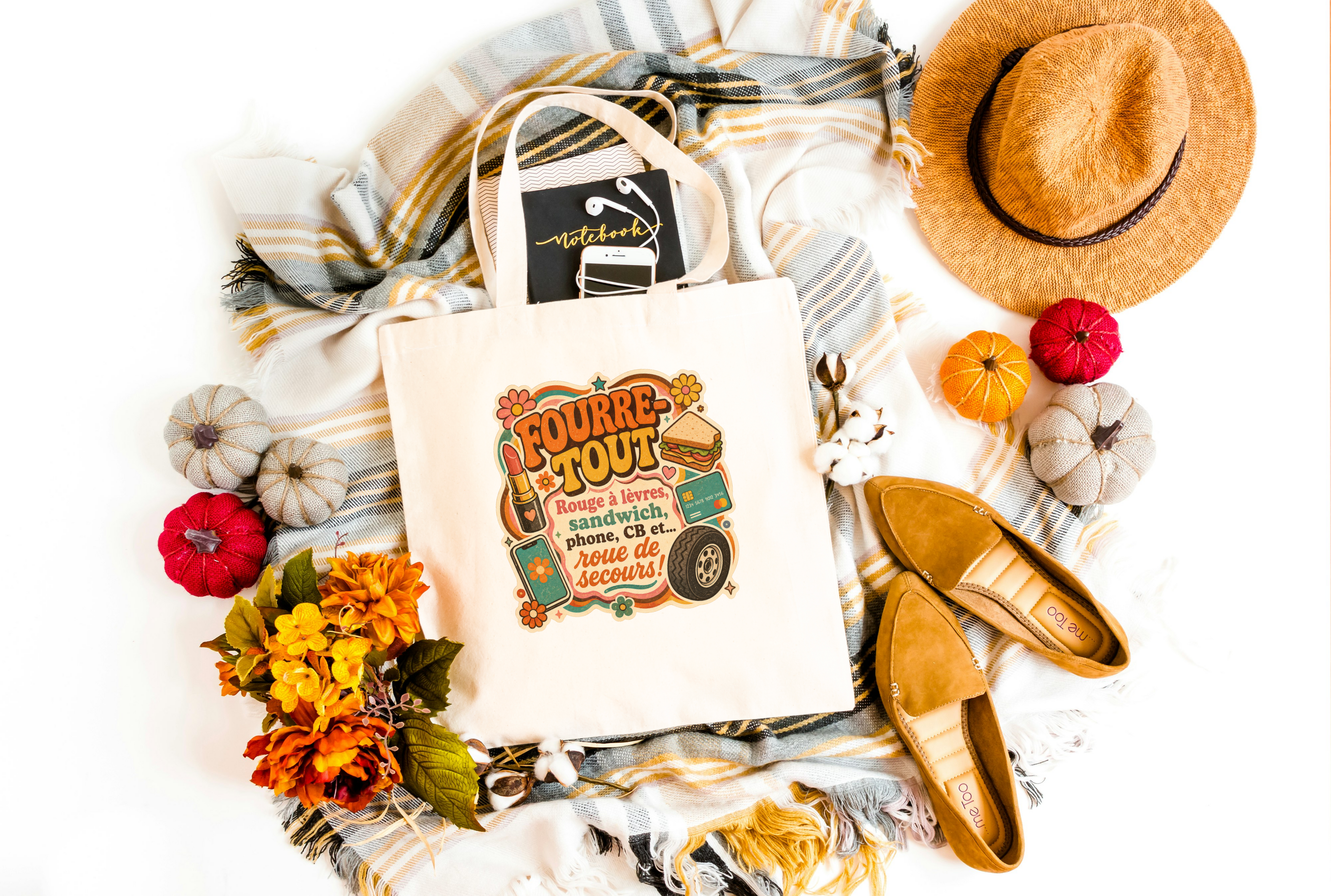 Sac fourre-tout en toile naturel avec imprimé 'Fourre Tout' coloré, anses longues.