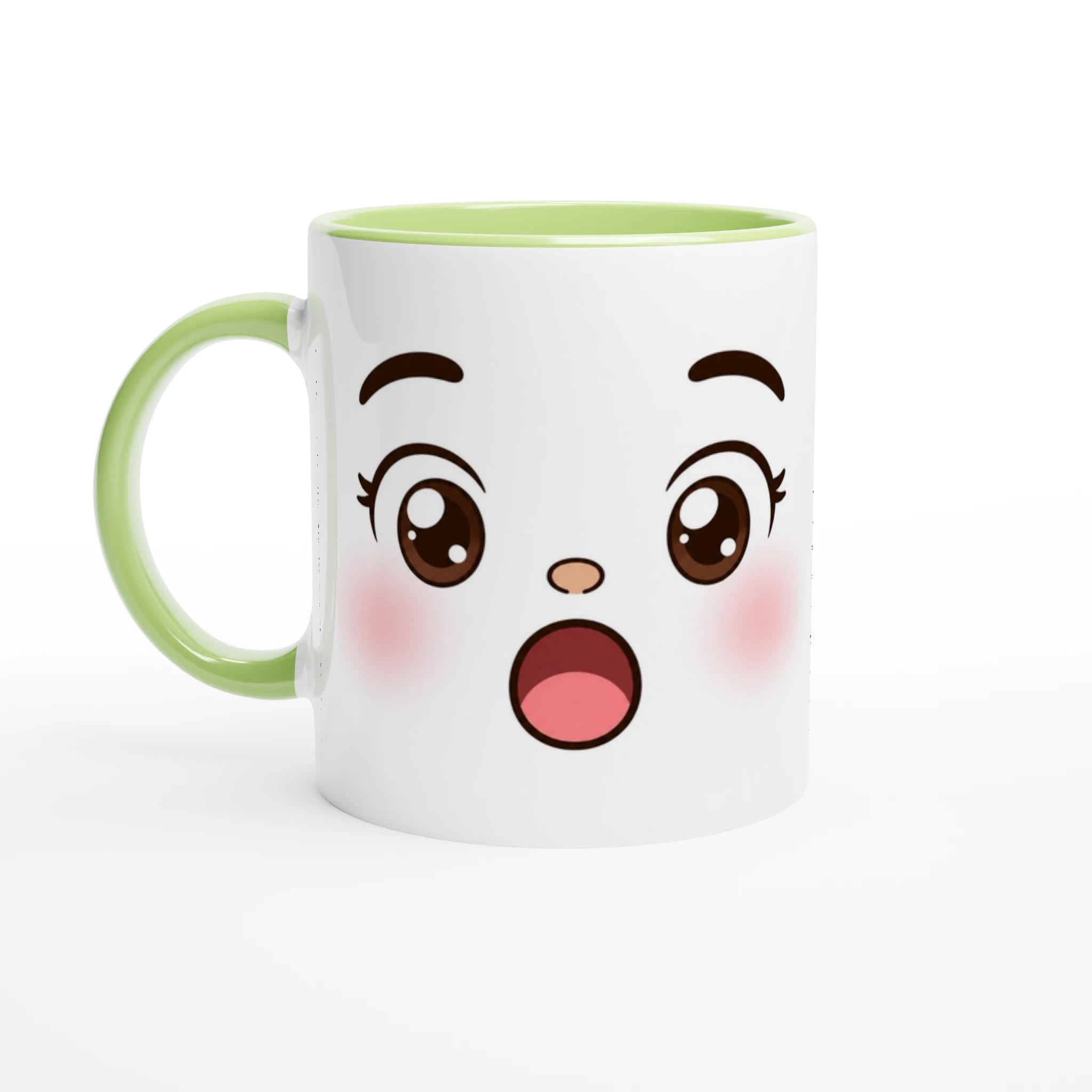 Tasse en céramique blanche au visage kawaii, poignée verte et bords verts.