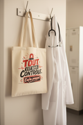Sac cabas en toile crème avec motif « Tout est sous contrôle » rouge et noir.